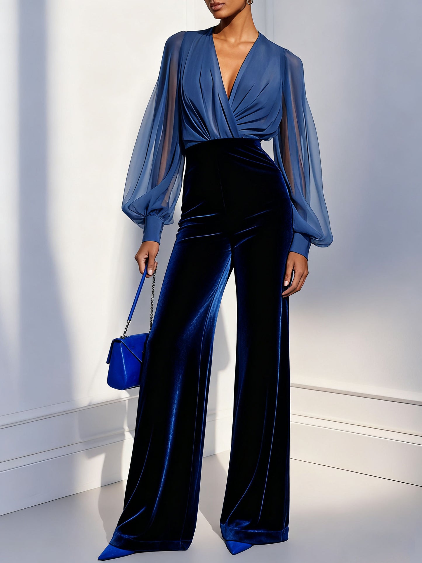 https://ik.imagekit.io/c2dr4dawp/https%3A%2F%2Fcdn.shopify.com%2Fs%2Ffiles%2F1%2F0956%2F9930%2F4789%2Ffiles%2FWomenRoyalBlueMeshVNeckLongSleeveVelvetJumpsuit_1.png%3Fv%3D1774590771?tr=f-jpg