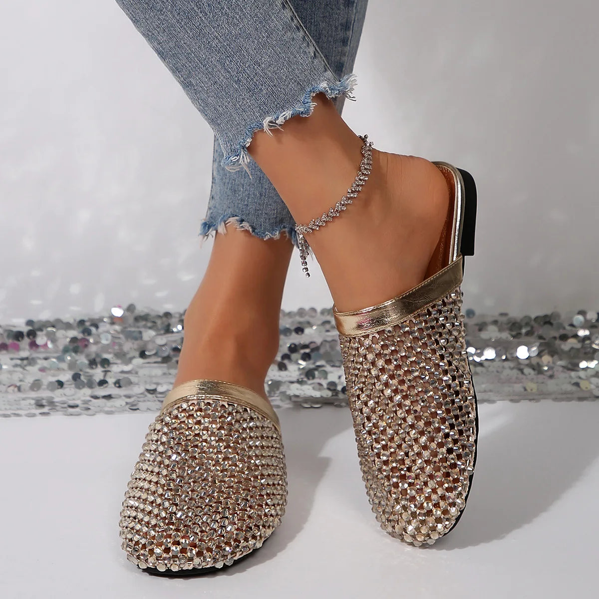 https://ae-pic-a1.aliexpress-media.com/kf/S96ece55113a7464f9fc17f2ada509701s/Summer-Women-Slippers-New-Flat-Round-Toe-Slippers-Women-Breathable-Rhinestone-Hollow-Out-Fashion-Sandals-Zapatos.jpg