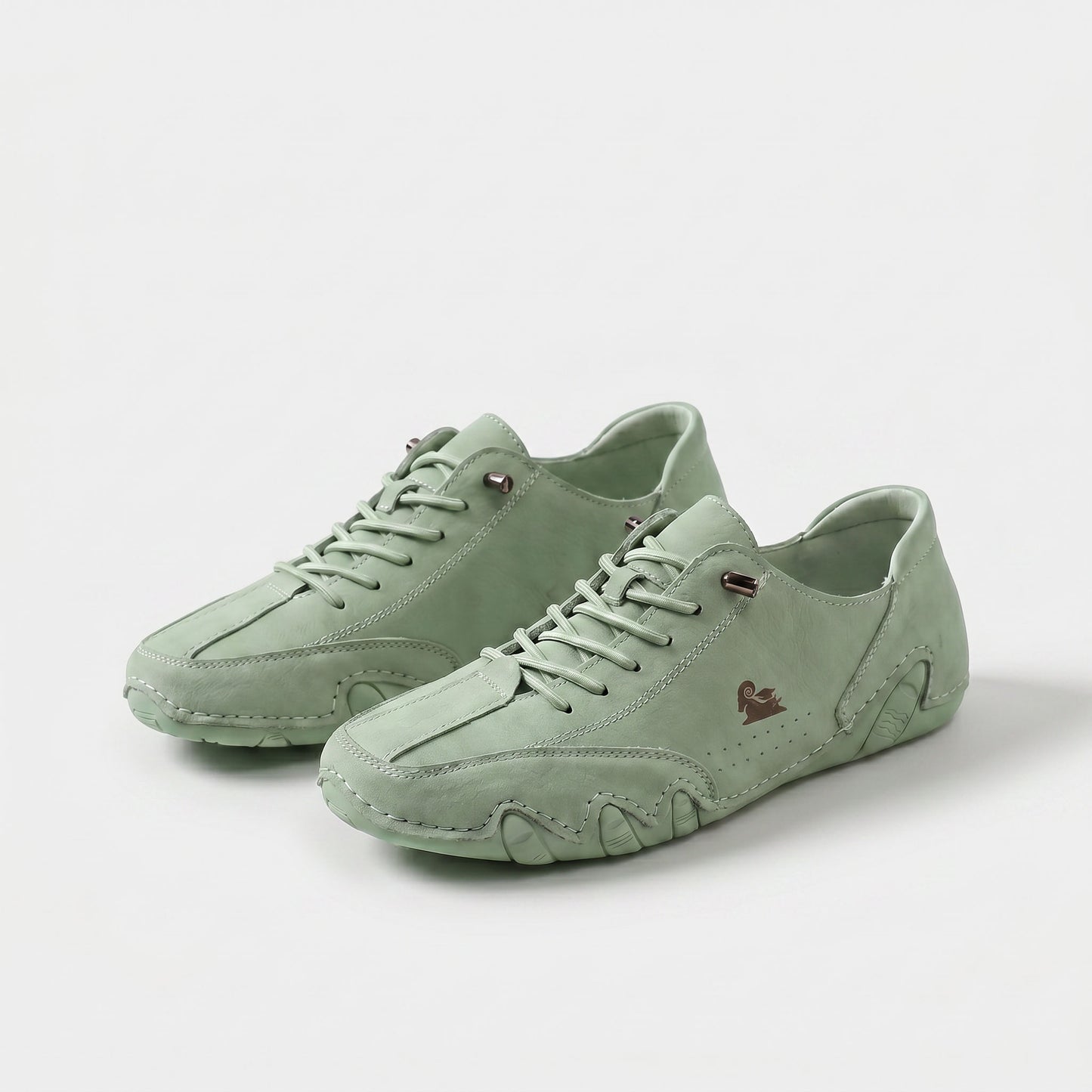https://ik.imagekit.io/c2dr4dawp/https%3A%2F%2Fcdn.shopify.com%2Fs%2Ffiles%2F1%2F0895%2F7870%2F1129%2Ffiles%2Fmilo-comfort-sneaker-for-effortless-steps-light-green-1.png%3Fv%3D1779376219?tr=f-jpg