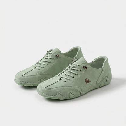 https://ik.imagekit.io/c2dr4dawp/https%3A%2F%2Fcdn.shopify.com%2Fs%2Ffiles%2F1%2F0895%2F7870%2F1129%2Ffiles%2Fmilo-comfort-sneaker-for-effortless-steps-light-green-1.png%3Fv%3D1779376219?tr=f-jpg