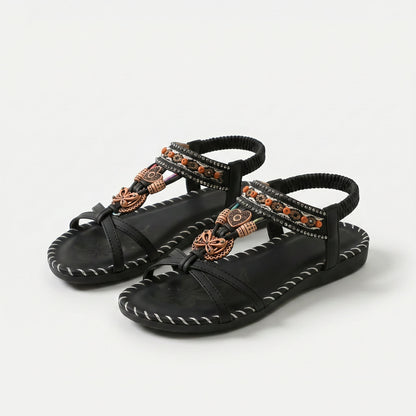 https://ik.imagekit.io/c2dr4dawp/https%3A%2F%2Fcdn.shopify.com%2Fs%2Ffiles%2F1%2F0895%2F7870%2F1129%2Ffiles%2Fnada-orthopedic-sandals-in-ibiza-style-for-comfort-elegance-black-1.png%3Fv%3D1779386249?tr=f-jpg