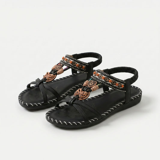 https://ik.imagekit.io/c2dr4dawp/https%3A%2F%2Fcdn.shopify.com%2Fs%2Ffiles%2F1%2F0895%2F7870%2F1129%2Ffiles%2Fnada-orthopedic-sandals-in-ibiza-style-for-comfort-elegance-black-1.png%3Fv%3D1779386249?tr=f-jpg