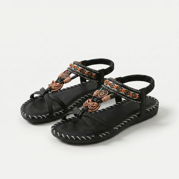 https://ik.imagekit.io/c2dr4dawp/https%3A%2F%2Fcdn.shopify.com%2Fs%2Ffiles%2F1%2F0895%2F7870%2F1129%2Ffiles%2Fnada-orthopedic-sandals-in-ibiza-style-for-comfort-elegance-black-1.png%3Fv%3D1779386249?tr=f-jpg