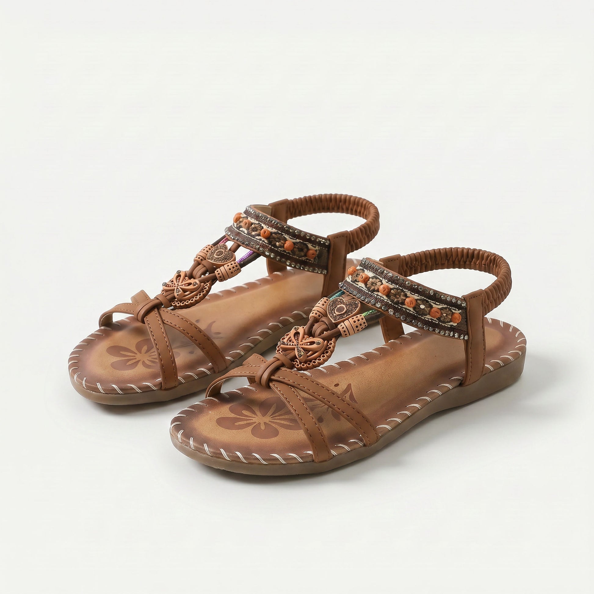 https://ik.imagekit.io/c2dr4dawp/https%3A%2F%2Fcdn.shopify.com%2Fs%2Ffiles%2F1%2F0895%2F7870%2F1129%2Ffiles%2Fnada-orthopedic-sandals-in-ibiza-style-for-comfort-elegance-brown-1.png%3Fv%3D1779386249?tr=f-jpg