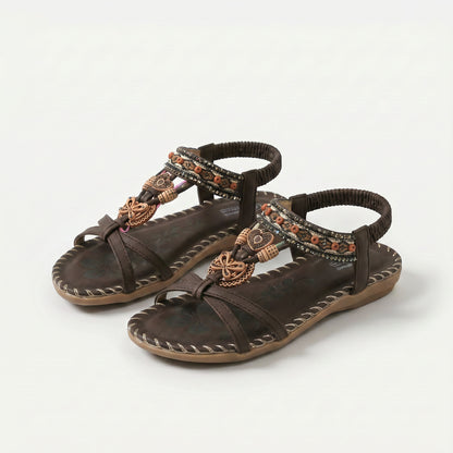 https://ik.imagekit.io/c2dr4dawp/https%3A%2F%2Fcdn.shopify.com%2Fs%2Ffiles%2F1%2F0895%2F7870%2F1129%2Ffiles%2Fnada-orthopedic-sandals-in-ibiza-style-for-comfort-elegance-dark-blue-brown-1.png%3Fv%3D1779386250?tr=f-jpg
