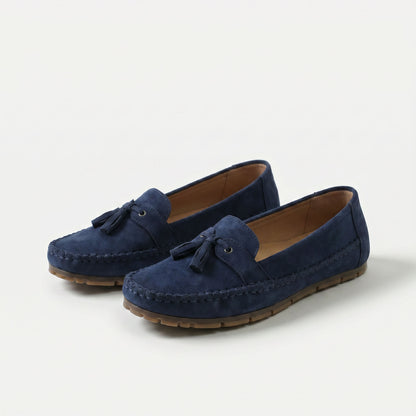 https://ik.imagekit.io/c2dr4dawp/https%3A%2F%2Fcdn.shopify.com%2Fs%2Ffiles%2F1%2F0895%2F7870%2F1129%2Ffiles%2Fnadine-classic-loafers-with-tassel-detail-blue-1.png%3Fv%3D1779386670?tr=f-jpg