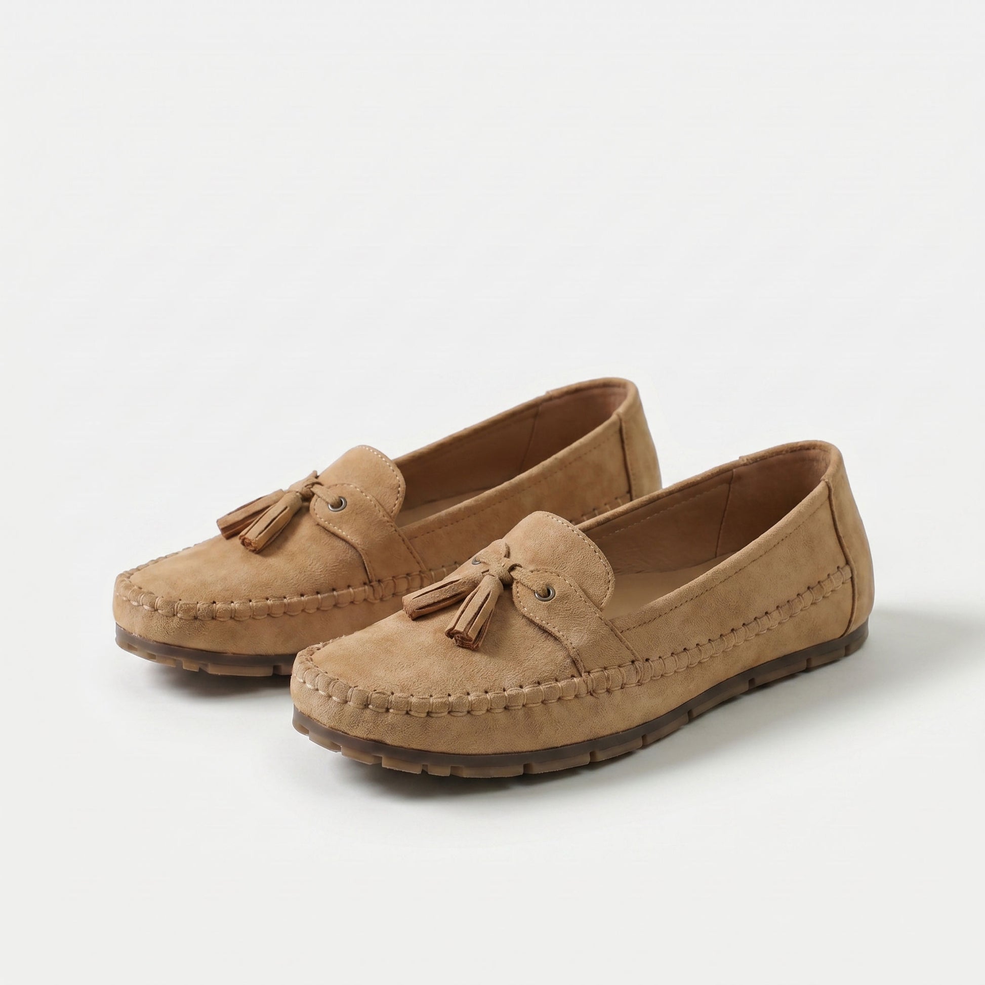 https://ik.imagekit.io/c2dr4dawp/https%3A%2F%2Fcdn.shopify.com%2Fs%2Ffiles%2F1%2F0895%2F7870%2F1129%2Ffiles%2Fnadine-classic-loafers-with-tassel-detail-caramel-brown-1.png%3Fv%3D1779386670?tr=f-jpg