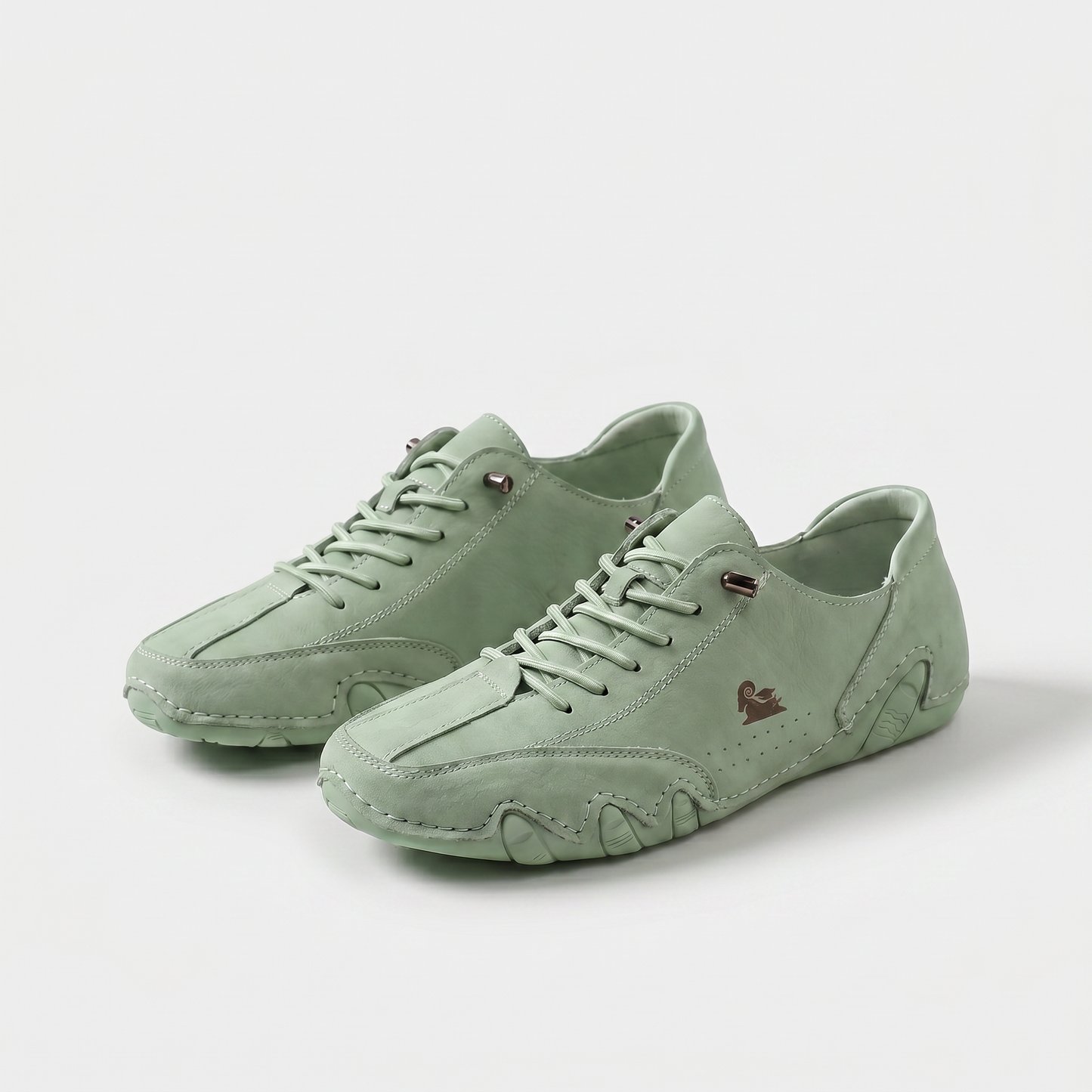 https://cdn.shopify.com/s/files/1/0895/7870/1129/files/milo-comfort-sneaker-for-effortless-steps-light-green-1.png?v=1779376219