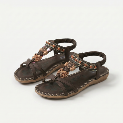 https://cdn.shopify.com/s/files/1/0895/7870/1129/files/nada-orthopedic-sandals-in-ibiza-style-for-comfort-elegance-dark-blue-brown-1.png?v=1779386250