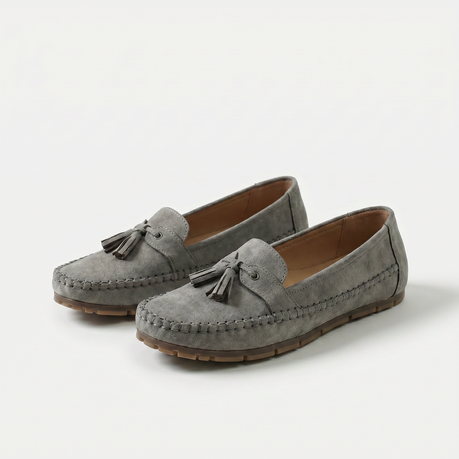 https://cdn.shopify.com/s/files/1/0895/7870/1129/files/nadine-classic-loafers-with-tassel-detail-gray-1.png?v=1779386670